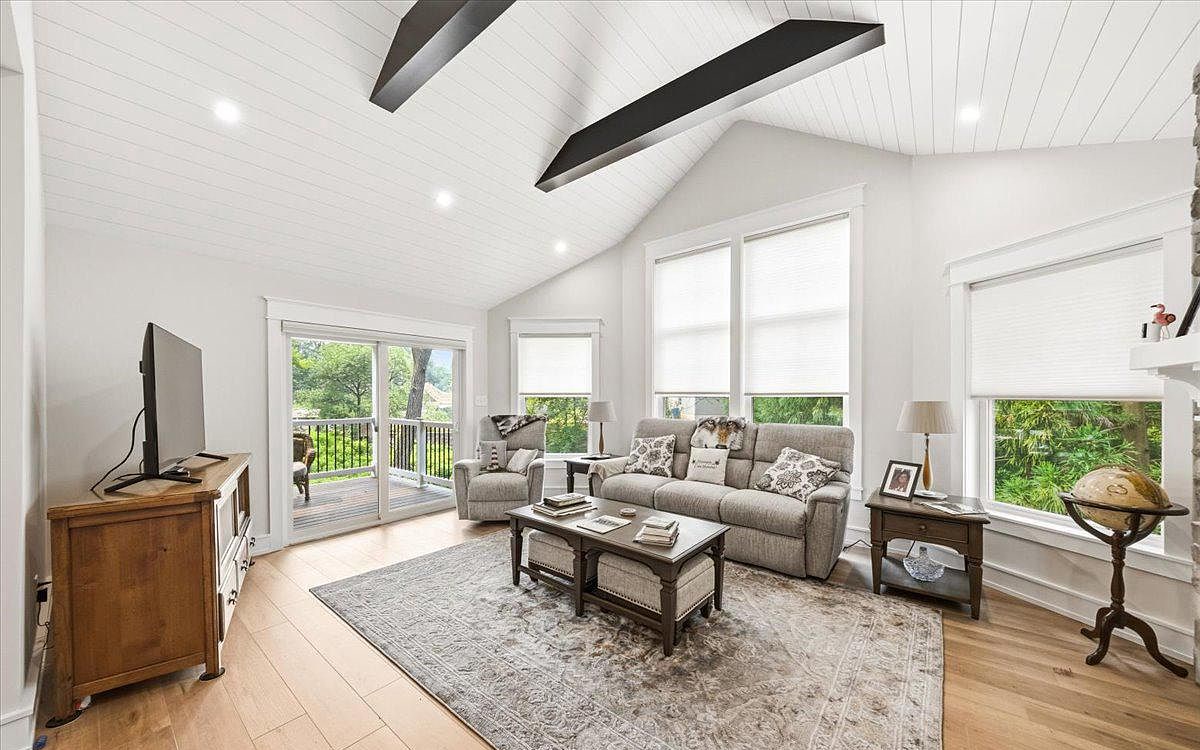 Vaulted living room with black beams